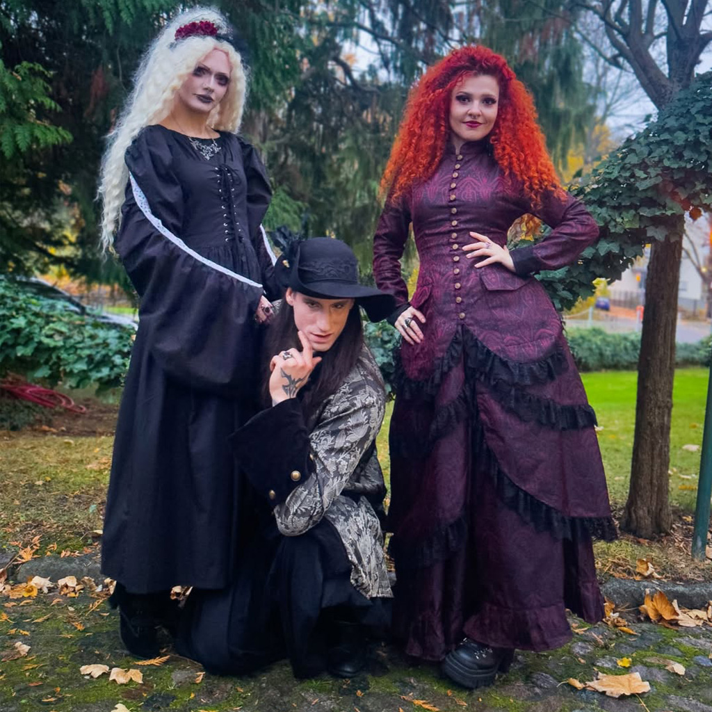 Medieval dress with flowing sleeves at a castle fair